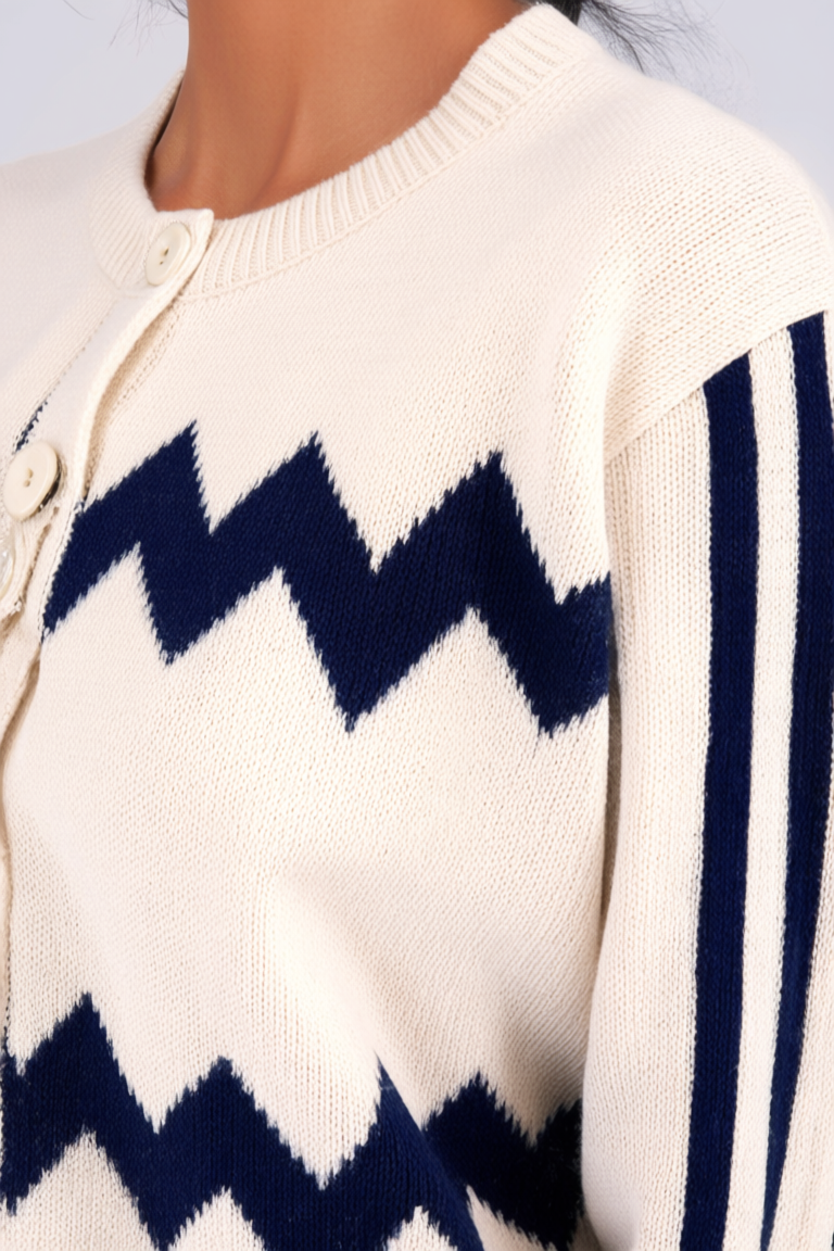 Qwen Image Edit close apparel detail of the ivory zigzag cardigan